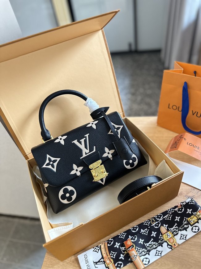 Louis Vuitton Madeleine Embossed Handbag 