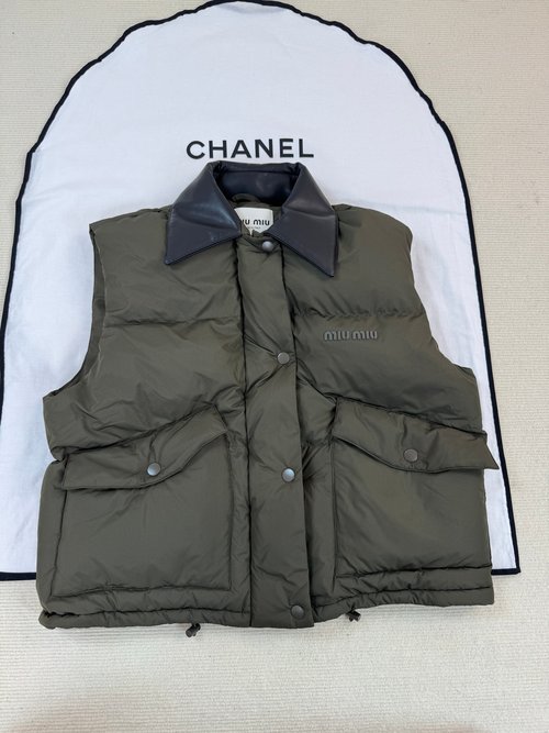 Miu Miu Stylish Down Vest with Intricate Detail Accents