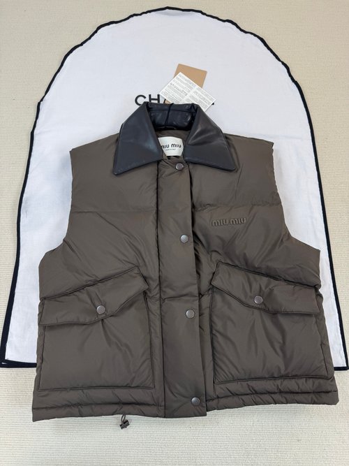 Miu Miu Chic Vest Adorned with Elegant Detail Work