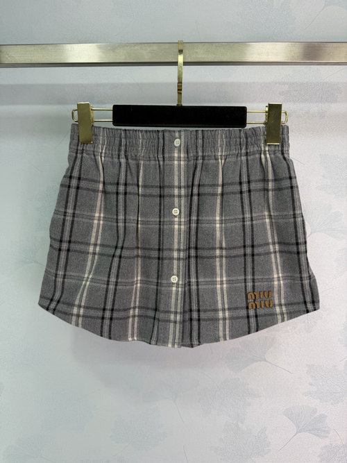 Miu Miu CHECKED PLAID PLEATED SKIRT WITH GOLD LOGO DETAIL