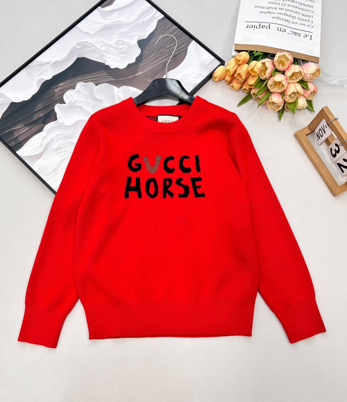Gucci Red knit sweater with cartoon patterns and logo
