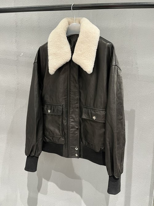 Yves Saint Laurent Stylish Moto Jacket with Detachable Fur Collar and Textured Leather