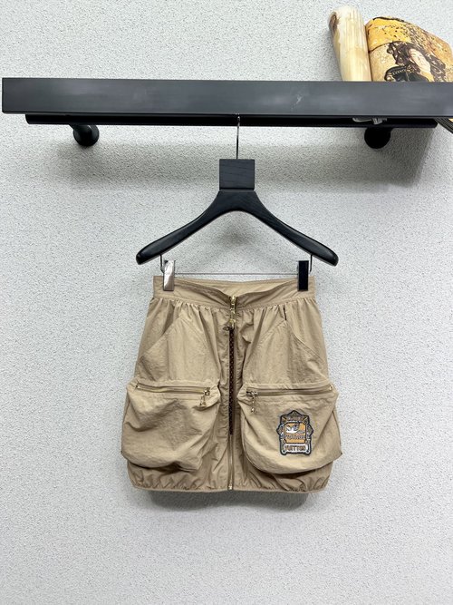 Louis Vuitton Elegant Khaki Hooded Outerwear and Skirt Ensemble