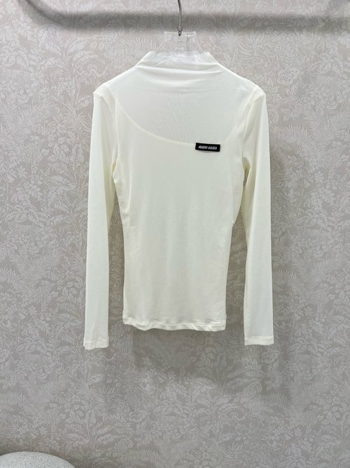 Miu Miu Sheer Turtleneck Blouse with Classic Logo Patch, Elegant Silhouette