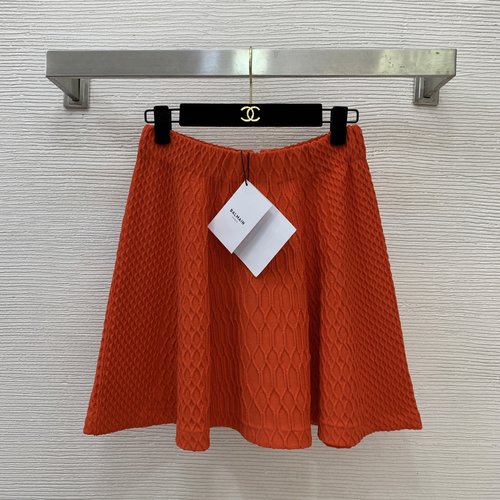 Balmain Textured Diamond Pattern Knitted Flared Mini Skirt in Orange Red, Black, and White