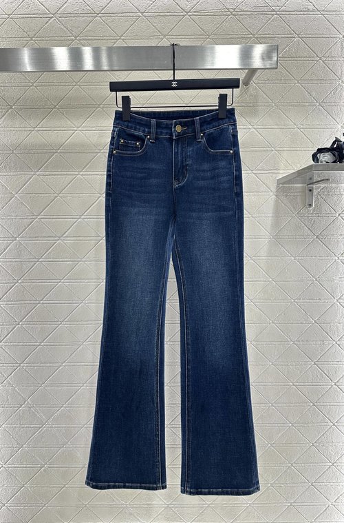 Louis Vuitton Elastic Flare Jeans with Vintage Hue and Leather Branding
