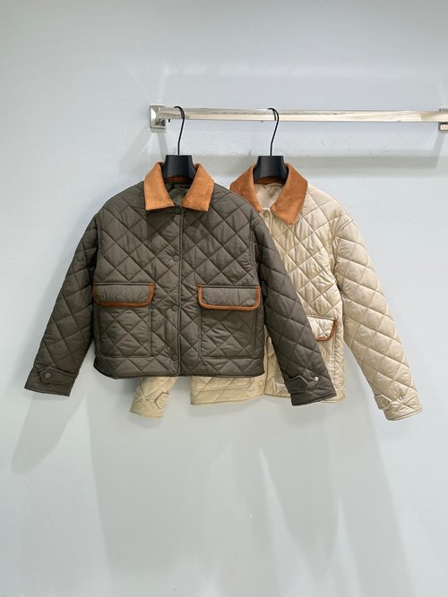 Miu Miu Quilted Down Jacket with Soft Silhouette and Leather Adornments
